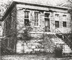 The Old Jail. Constructed of Kansas limestone in 1876, used until construction of new jail in 1959.